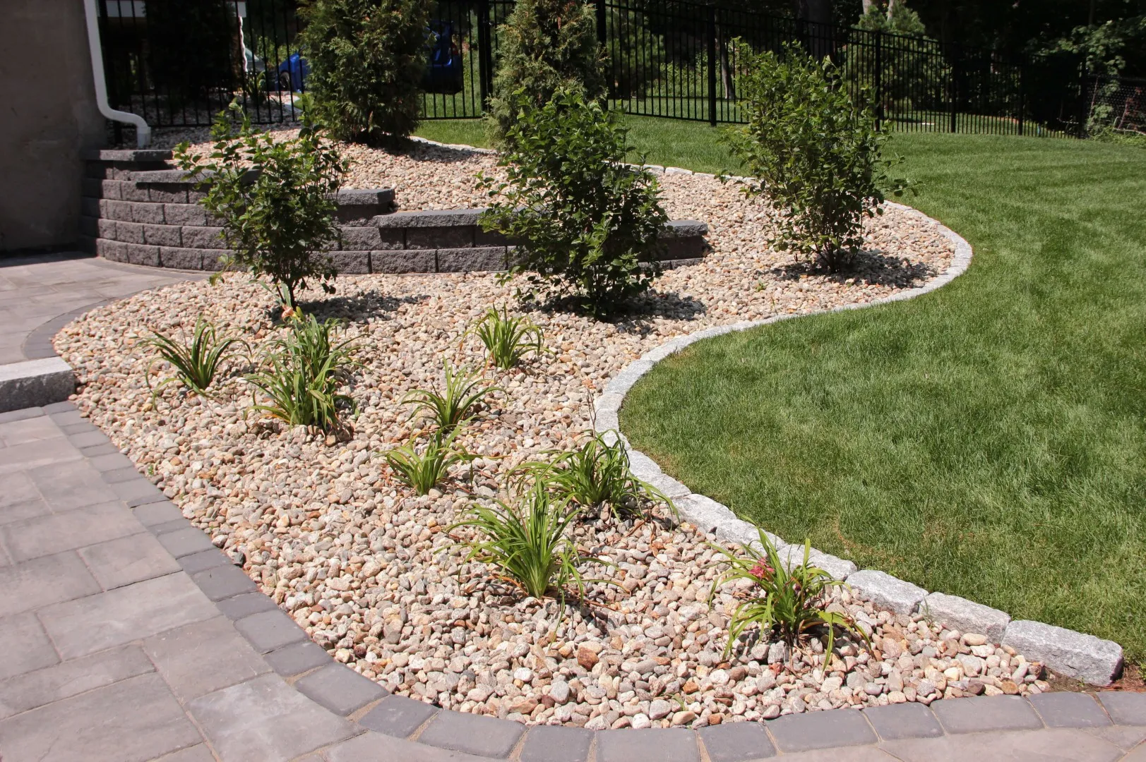Close-up of permeable pavers used in lakefront landscaping to improve drainage